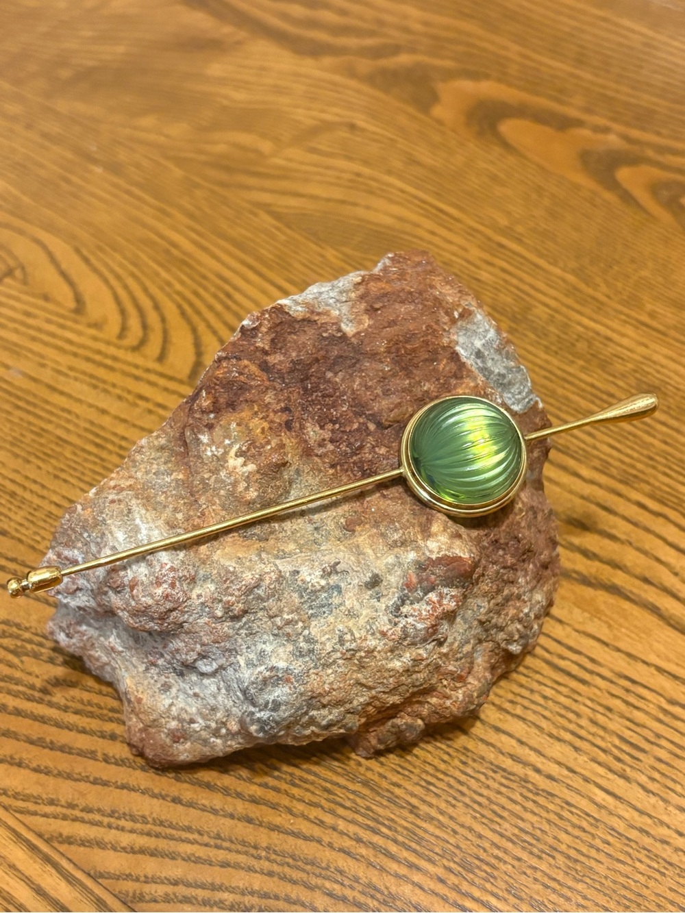 Vintage Lalique France gold tone pin with peridot color crystal
